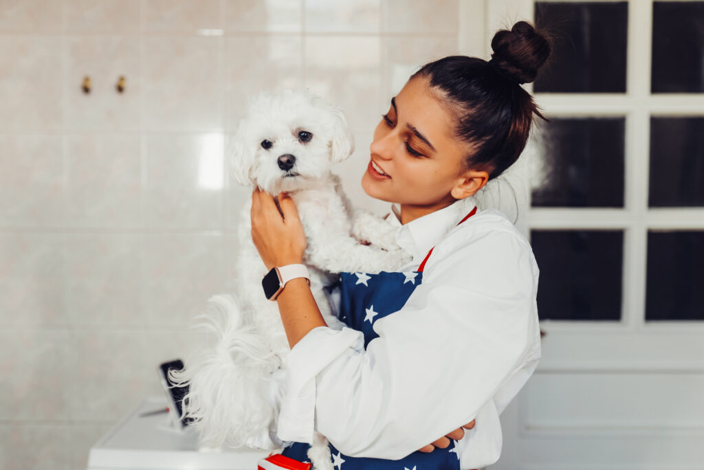 Image of a happ dog and beautifull girl
